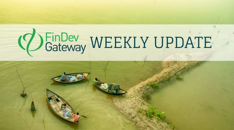 Boats on a river. Photo by Sudipta Das, 2015 CGAP Photo Contest.