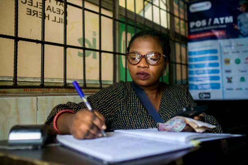 Mobile money agent at work, Nigeria.