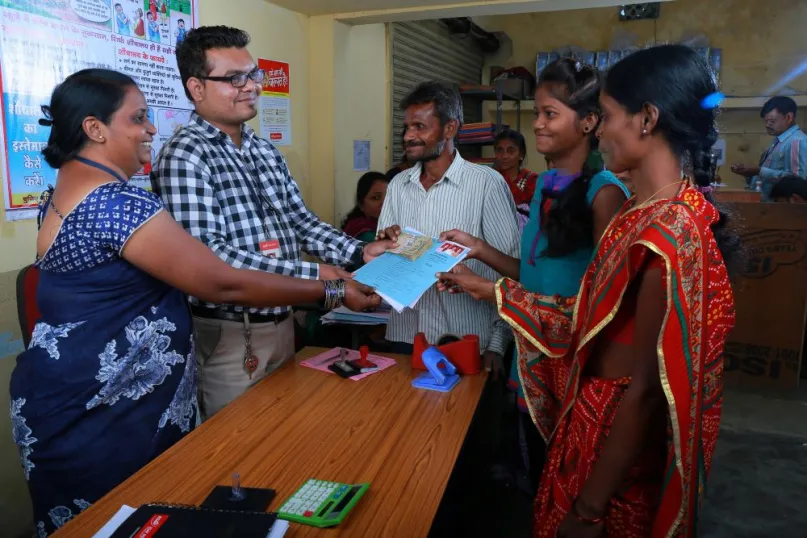 Taking out a microfinance loan, India. Photo by Aswin Antony, 2017 CGAP Photo Contest.