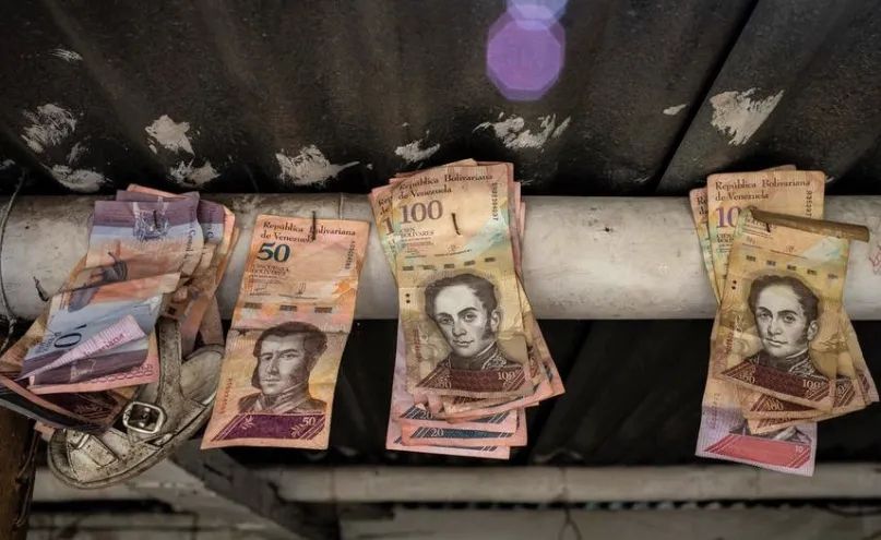 Venezuelan Bolivar banknotes displayed in a shop, Pamplona, Colombia.