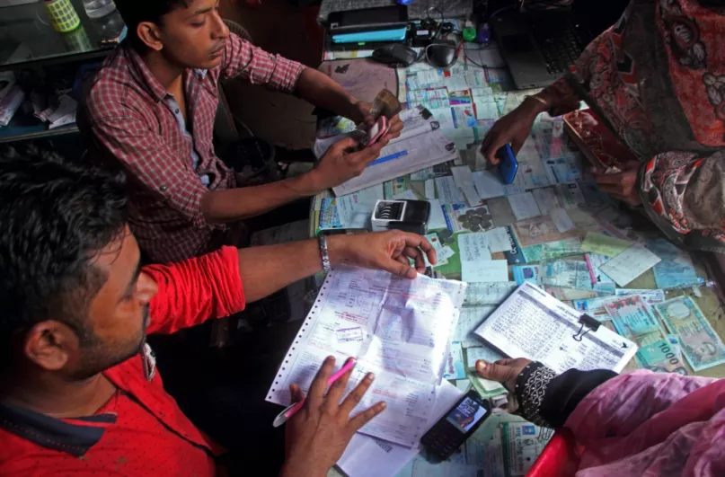 Mobile banking in Bangladesh. Photo credit: Moksumul Haque, 2016 CGAP Photo Contest.