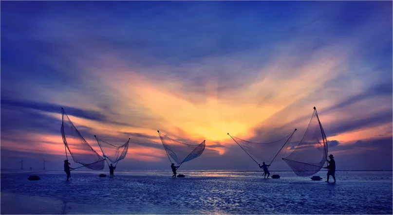 Fishermen in Vietnam. Photo credit: Vu Thanh, 2017 CGAP Photo Contest.