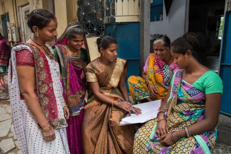 Neighborhood women organize in Ahmedabad, India. Photo credit: Paula Bronstein/Getty Images Reportage.