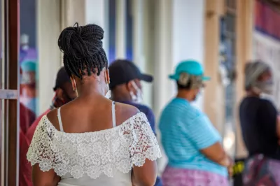 Women standing in line. CFI Photo.