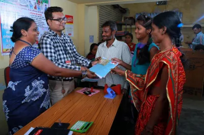 Taking out a microfinance loan, India. Photo by Aswin Antony, 2017 CGAP Photo Contest.