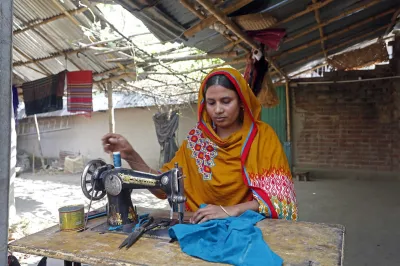 Woman on sewing machine