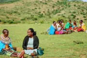 Rose Lelesiit (left) talking to her BOMA Village Mentor Sarah Sein Lanyasunya, in Maralal, Kenya at a meeting of Rose’s Savings Group. Photo credit: Jane Klonsky for the BOMA Project.