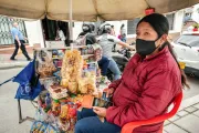 Colombian woman selling at market