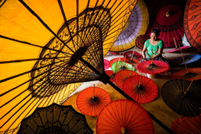 Woman making umbrellas